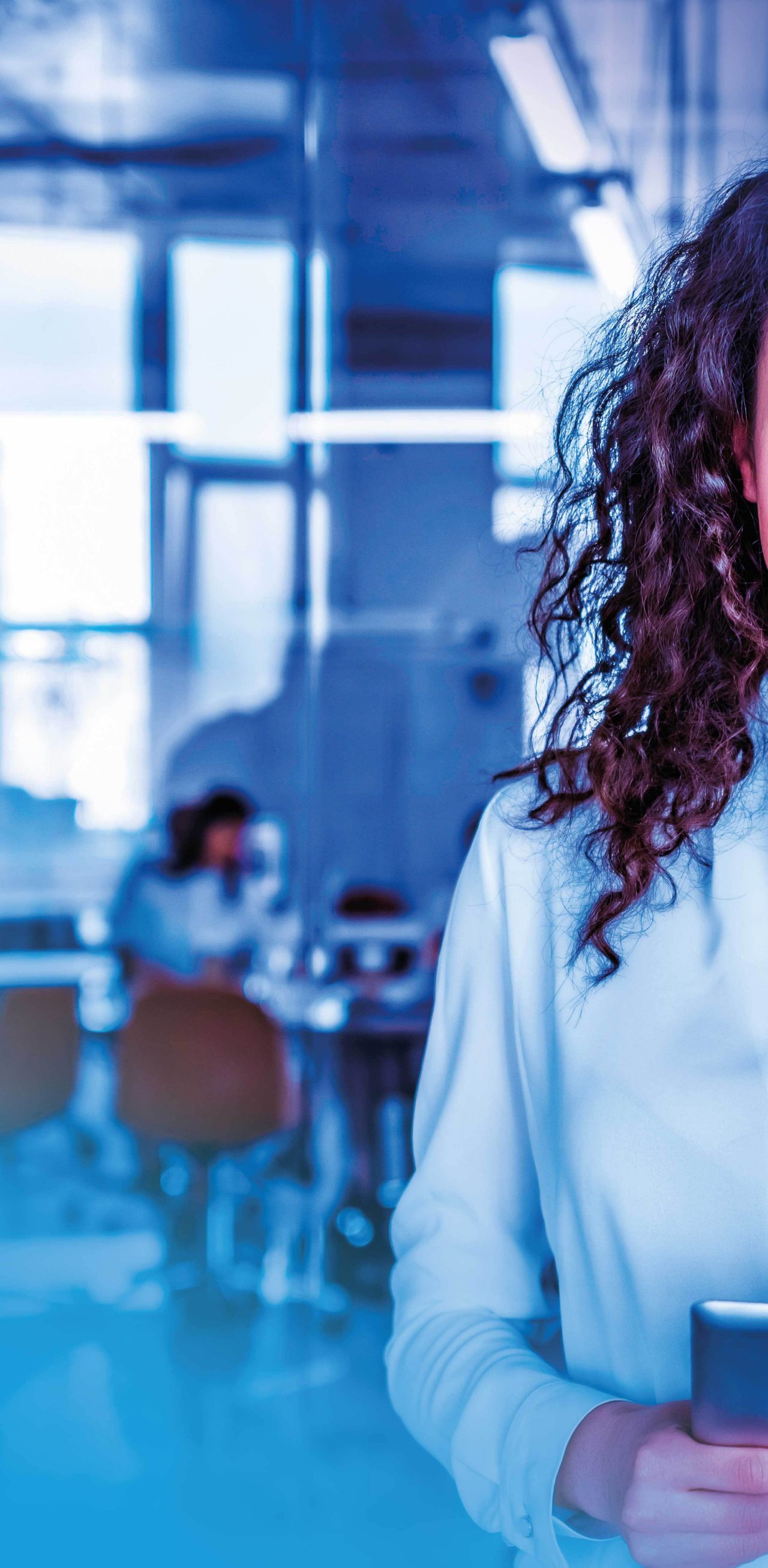 Mosaic image of business woman holding tablet