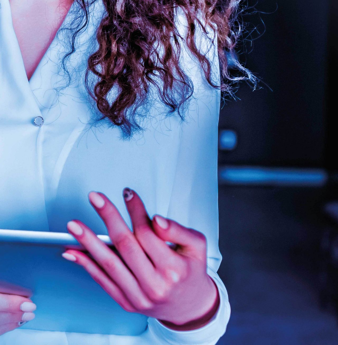 Mosaic image of business woman holding tablet