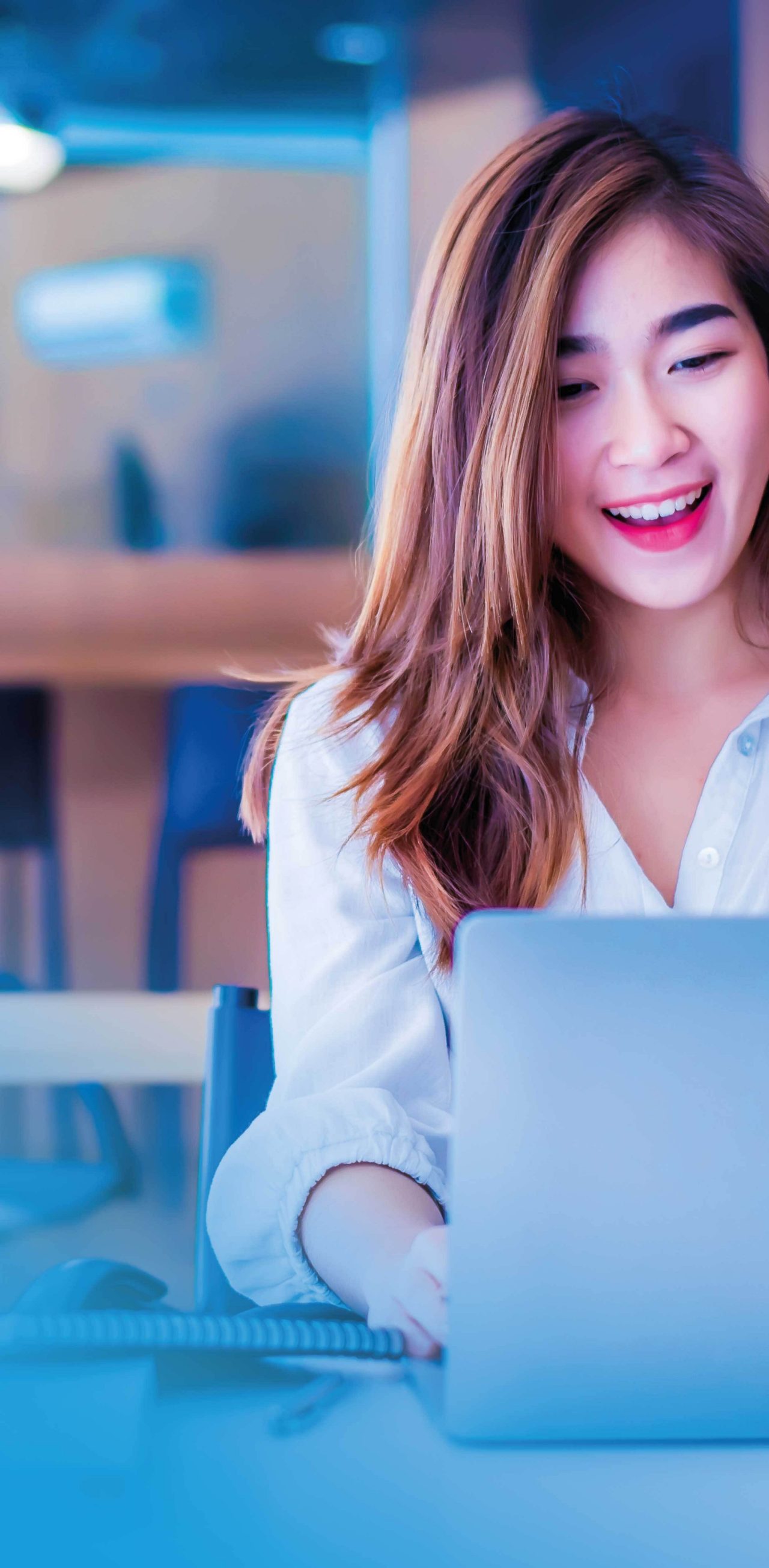 Mosaic image of business woman working at laptop and smiling