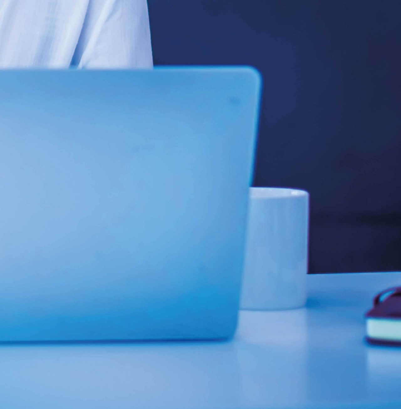 Continuation of mosaic image of business woman working at laptop and smiling